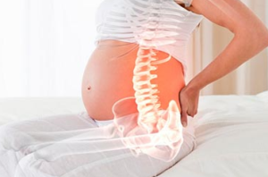 В начале беременности болят колени