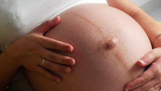 Сухая кожа в пупке во время беременности