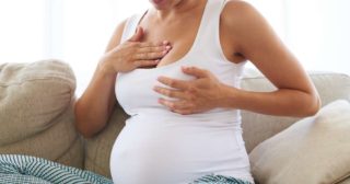 При беременности с какого дня начинает болеть грудь