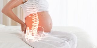 Болит поясница при беременности чем мазать
