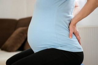 Защемление поясницы во время беременности